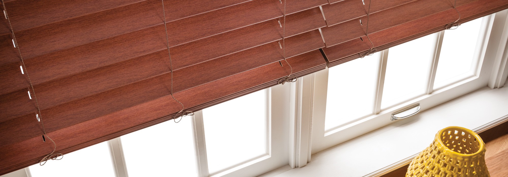 Blinds look great as long as slats remain straight - faux wood vs real wood blinds