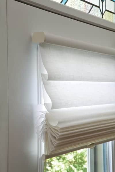 Roman Shades Hand Cordless — You use hands to move the shade up and down. A small grip handle enables the easy move up and down — No Cords
