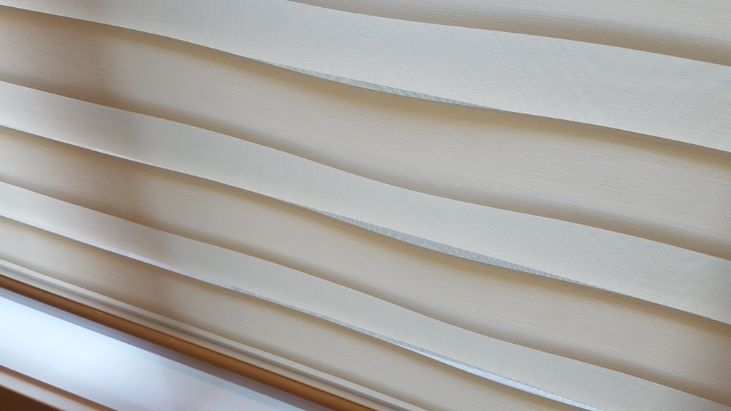 Banded Sheer Roller Fabric — Banded Sheer Roller Fabric — Flaw in the fabric may cause the waviness in the banded shades as you move the shade up and down — Not a good aesthetic