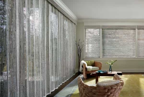Woven Wood Natural Drapery Door — Drapes are created from natural wood, reeds, bamboo and grasses. Gentle fabric folds bring added dimension to a room