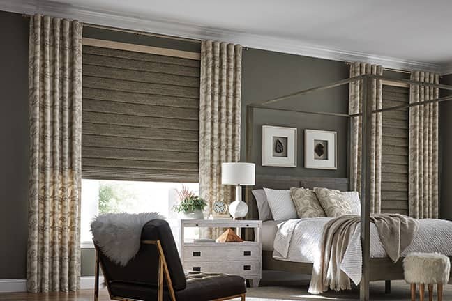 Woven Wood Blind Bedroom — You get room darkening fabrics with this style of shadings - roman shade folds feature fluid and smooth lines.