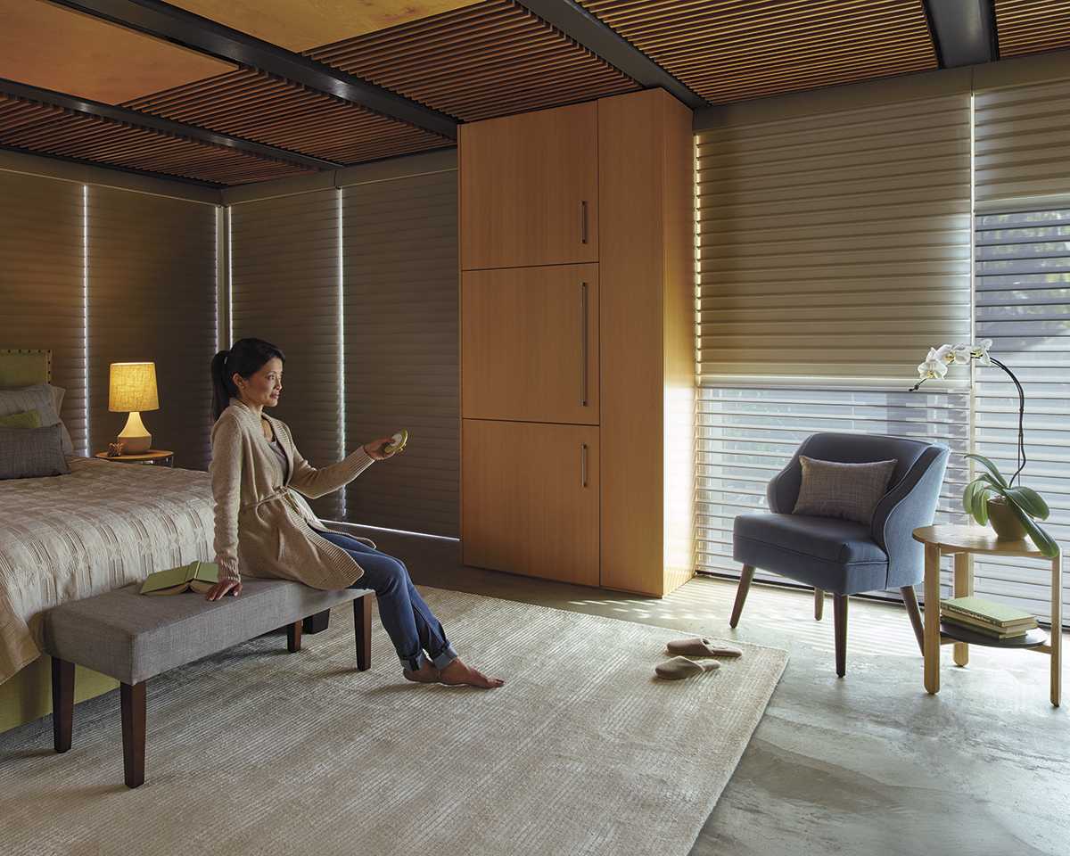 Silhouette Shades Bed Room window shades - An independent roller shade behind Silhouette for room darkening.