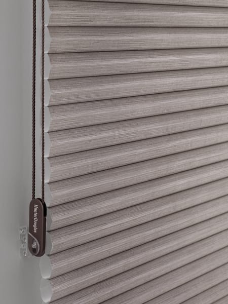 Honeycomb Blind Cord Loop — raise and lower your shades by simply pulling on the cord. Cord is mounted on the side using cord tension system.